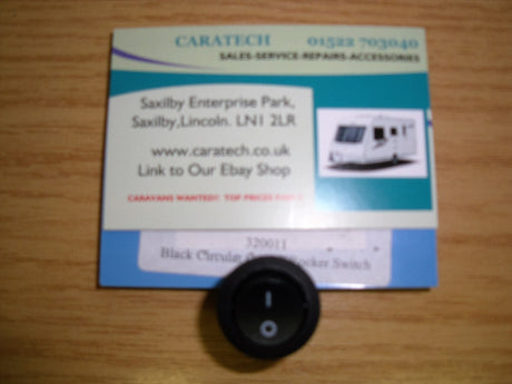 Circular on / off rocker switch - 12 v - Black - 320011 - Caratech Caravan Parts